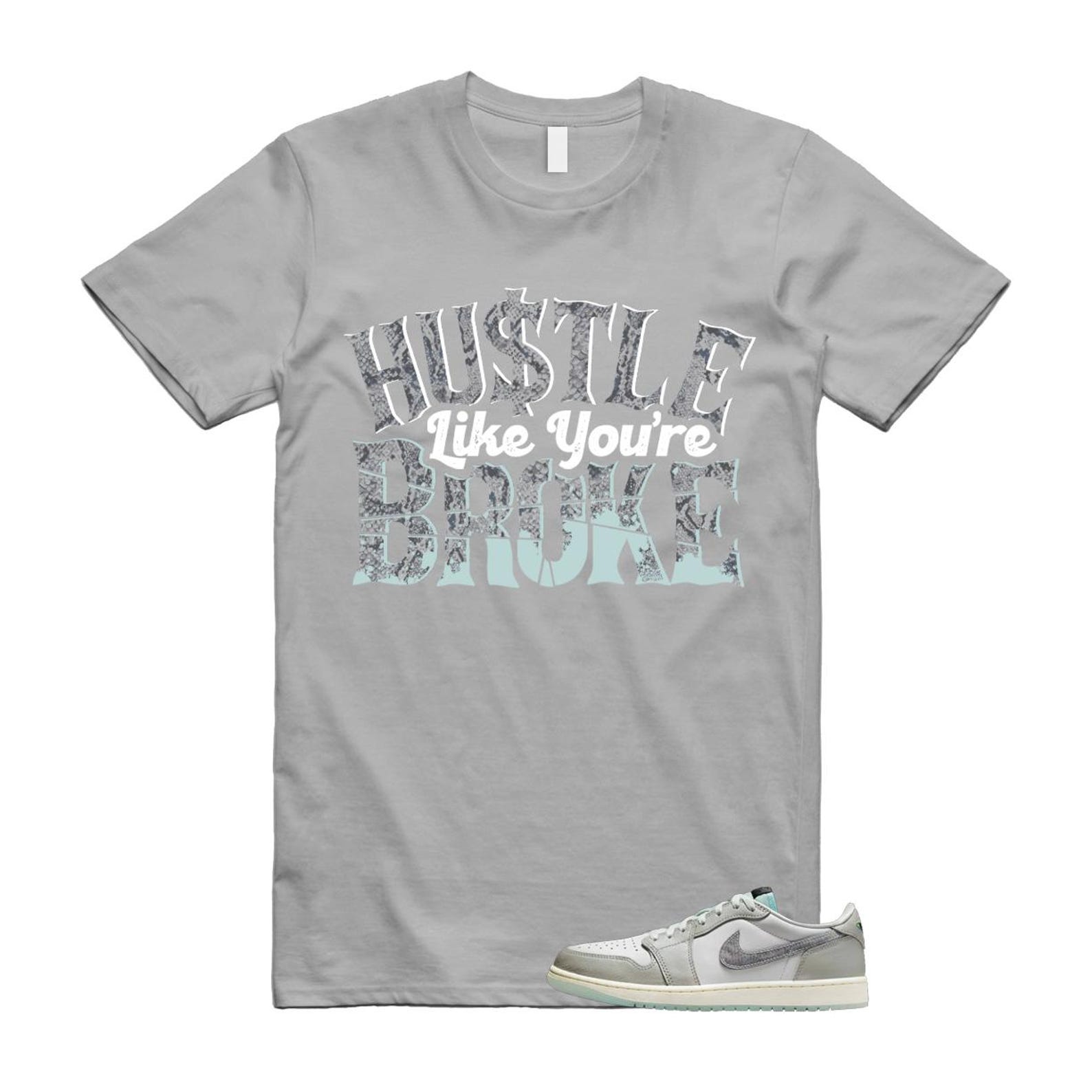 1 Year of the Snake Summit White Photon Dust Barely Green T Shirt Match Hustle Like You're Broke HF3144-100 T-Shirt, Sneaker Match Tee